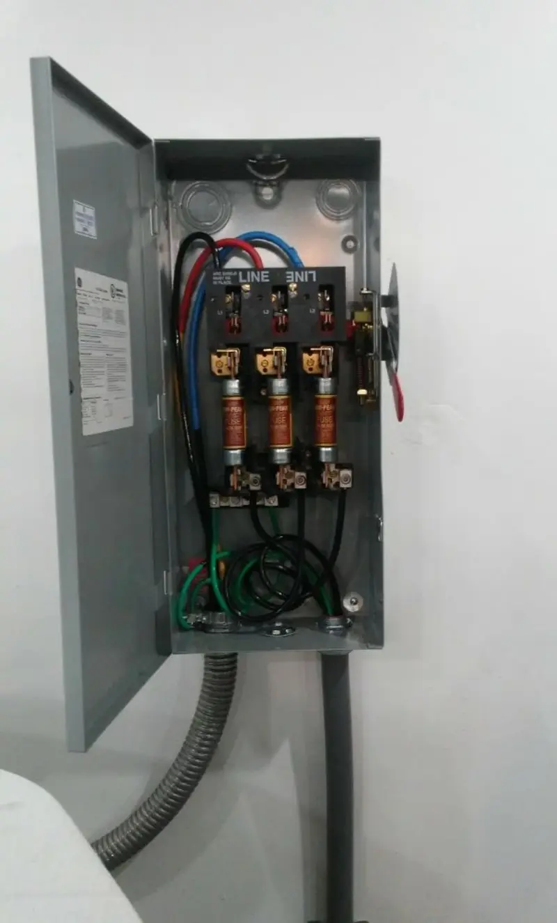 Three-phase disconnect switch installed for Smoke Detector Installation in Baden